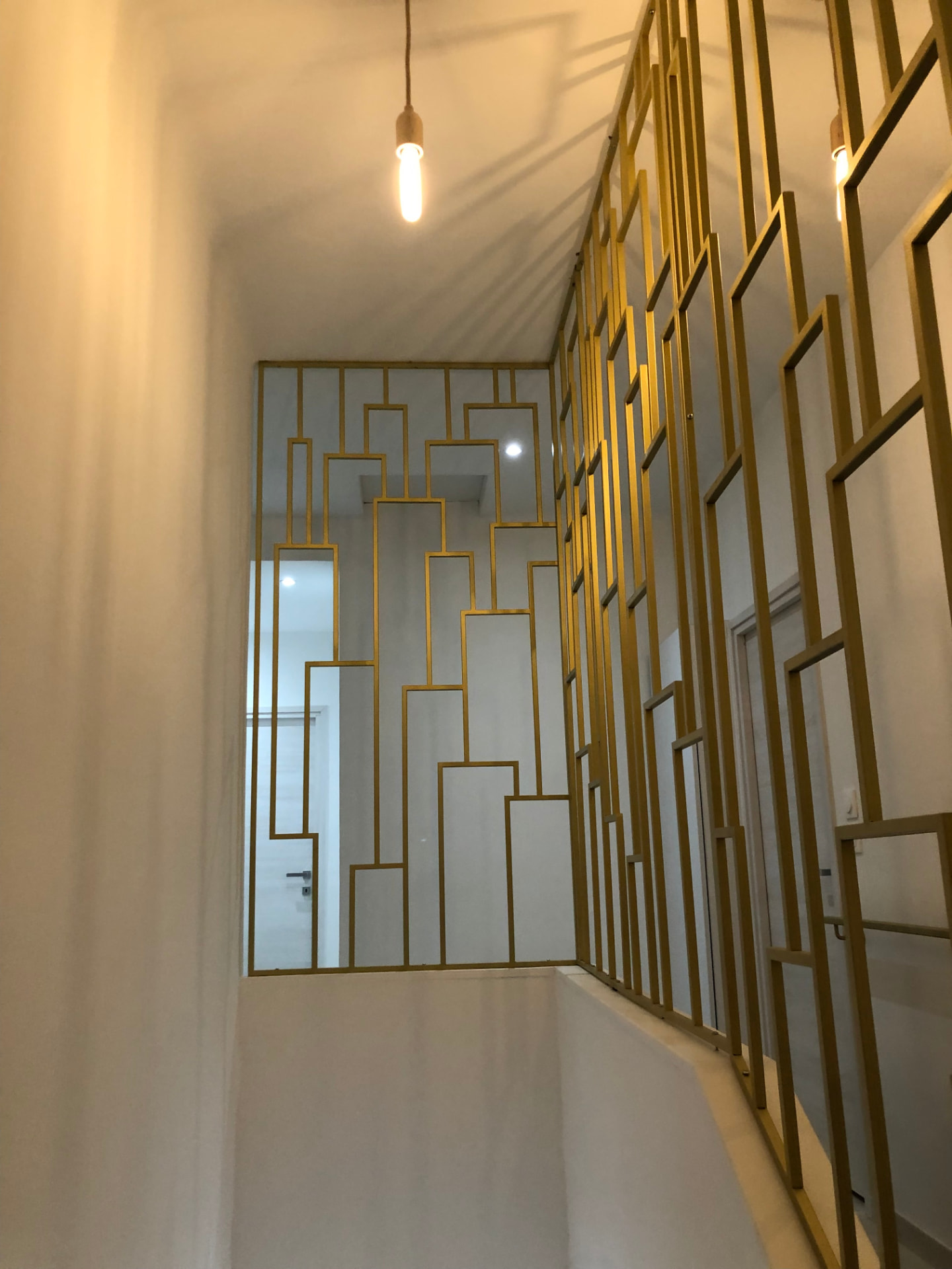 Garde-corps de palier en retour d'angle
